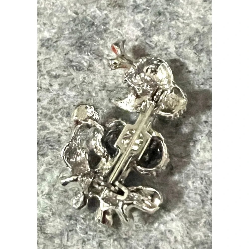 Vintage silver tone & red enamel poodle brooch